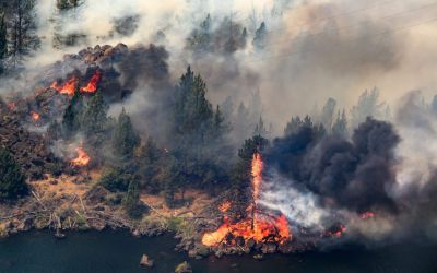 Firefighters work to contain wildfires raging through Native land